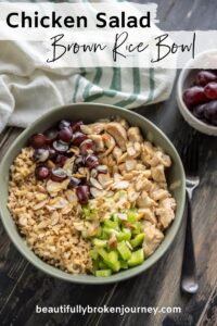 Chicken Salad in a grey bowl with celery, almonds and grapes