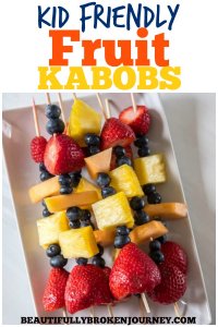 Easy and delicious Kid Friendly Fruit Kabobs are great to get your kids involved in the kitchen and also can be a great appetizer! #fruitkabobs #fruit #strawberries #blueberries #pineapple #healthysnacks #healthyrecipes #kabobs #fruitrecipes