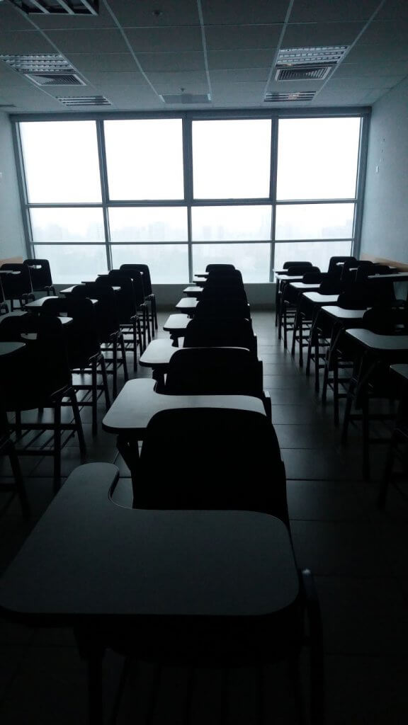 Empty school room with empty desks